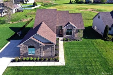 Welcome to this exceptional 4-bedroom, 2.5-bath custom home on Copper Ridge Golf Club in Michigan - for sale on GolfHomes.com, golf home, golf lot