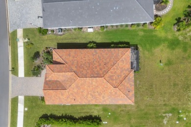 Designed to capture the best of its coastal locale, this on Boca Royale Golf and Country Club in Florida - for sale on GolfHomes.com, golf home, golf lot