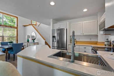Beautiful end-unit townhome in sought-after Water Valley with a on Pelican Lakes Golf and Country Club in Colorado - for sale on GolfHomes.com, golf home, golf lot