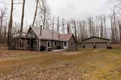 OPEN HOUSE  5/3/25 10AM-1PM Welcome to 6456 Wilderness Drive on Lakes of the North Deer Run Golf Course in Michigan - for sale on GolfHomes.com, golf home, golf lot