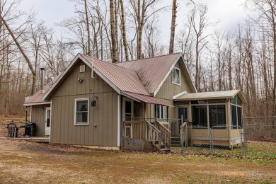 OPEN HOUSE  5/3/25 10AM-1PM Welcome to 6456 Wilderness Drive on Lakes of the North Deer Run Golf Course in Michigan - for sale on GolfHomes.com, golf home, golf lot