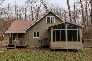 OPEN HOUSE  5/3/25 10AM-1PM Welcome to 6456 Wilderness Drive on Lakes of the North Deer Run Golf Course in Michigan - for sale on GolfHomes.com, golf home, golf lot