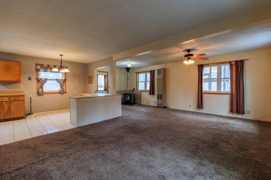 OPEN HOUSE  5/3/25 10AM-1PM Welcome to 6456 Wilderness Drive on Lakes of the North Deer Run Golf Course in Michigan - for sale on GolfHomes.com, golf home, golf lot