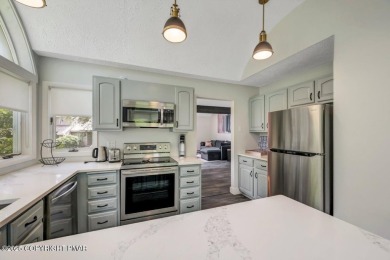 Showcasing lakeview luxury townhome in picturesque Pinecrest on Pinecrest Lake Golf and Country Club in Pennsylvania - for sale on GolfHomes.com, golf home, golf lot