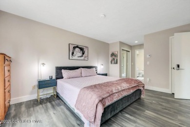 Showcasing lakeview luxury townhome in picturesque Pinecrest on Pinecrest Lake Golf and Country Club in Pennsylvania - for sale on GolfHomes.com, golf home, golf lot