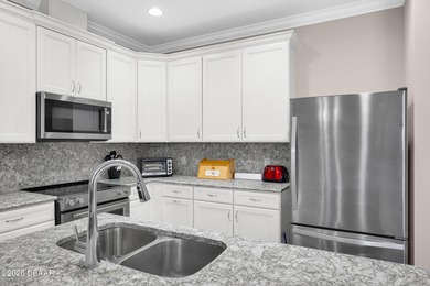 Experience the ultimate waterfront lifestyle in this on LPGA International Golf Course in Florida - for sale on GolfHomes.com, golf home, golf lot