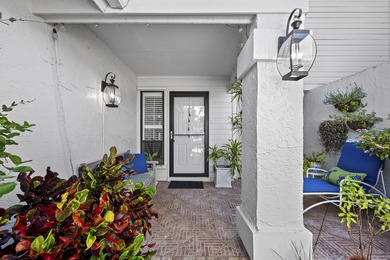 Spacious lakefront golf villa with 3 bedrooms, 2.5 bathrooms on Mariner Sands Country Club in Florida - for sale on GolfHomes.com, golf home, golf lot