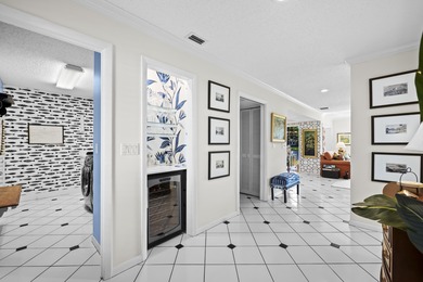 Spacious lakefront golf villa with 3 bedrooms, 2.5 bathrooms on Mariner Sands Country Club in Florida - for sale on GolfHomes.com, golf home, golf lot