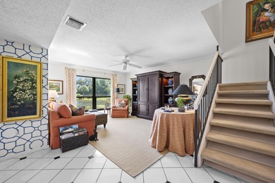 Spacious lakefront golf villa with 3 bedrooms, 2.5 bathrooms on Mariner Sands Country Club in Florida - for sale on GolfHomes.com, golf home, golf lot