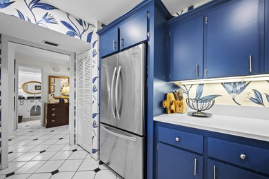 Spacious lakefront golf villa with 3 bedrooms, 2.5 bathrooms on Mariner Sands Country Club in Florida - for sale on GolfHomes.com, golf home, golf lot