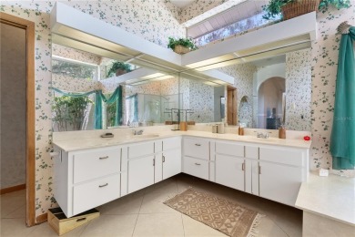 Experience the best of executive living in this beautifully on Walden Lake Golf and Country Club  in Florida - for sale on GolfHomes.com, golf home, golf lot