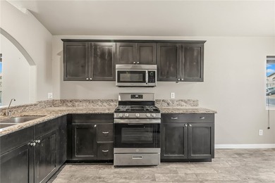 This charming 3 bedroom 2 bathroom home sits on a spacious on Desert Lakes Golf Course in Arizona - for sale on GolfHomes.com, golf home, golf lot