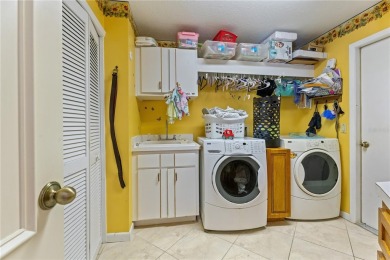 Experience the best of executive living in this beautifully on Walden Lake Golf and Country Club  in Florida - for sale on GolfHomes.com, golf home, golf lot