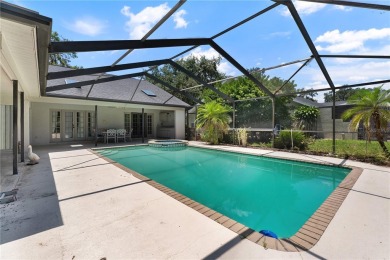 Experience the best of executive living in this beautifully on Walden Lake Golf and Country Club  in Florida - for sale on GolfHomes.com, golf home, golf lot