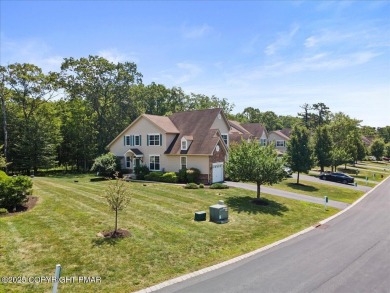 Step into sophistication with this beautifully designed End-Unit on Country Club of the Poconos Golf Course in Pennsylvania - for sale on GolfHomes.com, golf home, golf lot