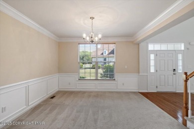 Step into sophistication with this beautifully designed End-Unit on Country Club of the Poconos Golf Course in Pennsylvania - for sale on GolfHomes.com, golf home, golf lot