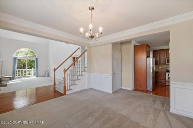 Step into sophistication with this beautifully designed End-Unit on Country Club of the Poconos Golf Course in Pennsylvania - for sale on GolfHomes.com, golf home, golf lot