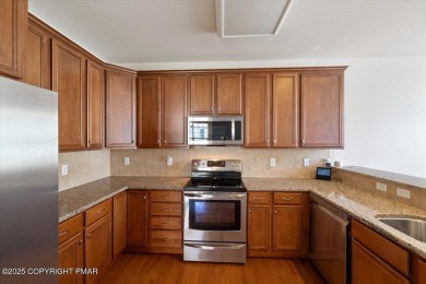 Step into sophistication with this beautifully designed End-Unit on Country Club of the Poconos Golf Course in Pennsylvania - for sale on GolfHomes.com, golf home, golf lot