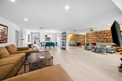 Enjoy beautiful golf course views from this bright and airy on  in Florida - for sale on GolfHomes.com, golf home, golf lot