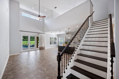 Gated in Beautiful Laurel Glen at Grasslands sits the *Wyndham* on Grasslands Golf and Country Club in Florida - for sale on GolfHomes.com, golf home, golf lot