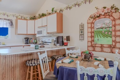 MOVE-IN-READY ~ FULLY FURNISHED and EQUIPPED (Just bring your on Lakes of the Four Seasons Country Club in Indiana - for sale on GolfHomes.com, golf home, golf lot