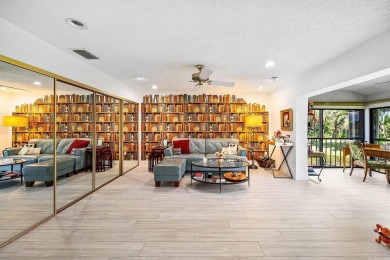 Enjoy beautiful golf course views from this bright and airy on  in Florida - for sale on GolfHomes.com, golf home, golf lot