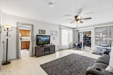 Welcome to this charming ''Sunlit Haven'' a 2BR/1 full bath/3/4 on PalmBrook Country Club in Arizona - for sale on GolfHomes.com, golf home, golf lot