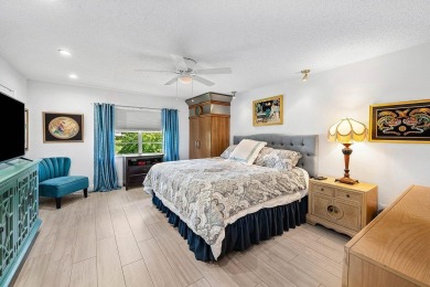 Enjoy beautiful golf course views from this bright and airy on  in Florida - for sale on GolfHomes.com, golf home, golf lot