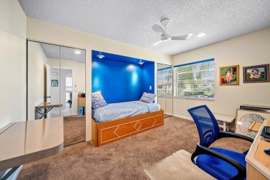 Enjoy beautiful golf course views from this bright and airy on  in Florida - for sale on GolfHomes.com, golf home, golf lot