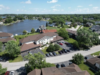 MOVE-IN-READY ~ FULLY FURNISHED and EQUIPPED (Just bring your on Lakes of the Four Seasons Country Club in Indiana - for sale on GolfHomes.com, golf home, golf lot