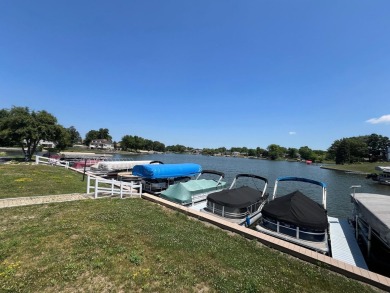 MOVE-IN-READY ~ FULLY FURNISHED and EQUIPPED (Just bring your on Lakes of the Four Seasons Country Club in Indiana - for sale on GolfHomes.com, golf home, golf lot