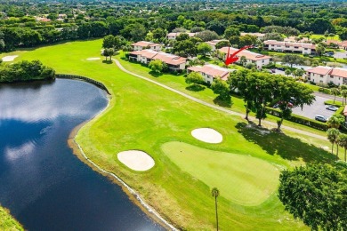 Enjoy beautiful golf course views from this bright and airy on  in Florida - for sale on GolfHomes.com, golf home, golf lot
