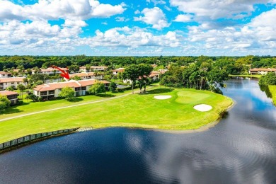 Enjoy beautiful golf course views from this bright and airy on  in Florida - for sale on GolfHomes.com, golf home, golf lot