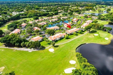 Enjoy beautiful golf course views from this bright and airy on  in Florida - for sale on GolfHomes.com, golf home, golf lot