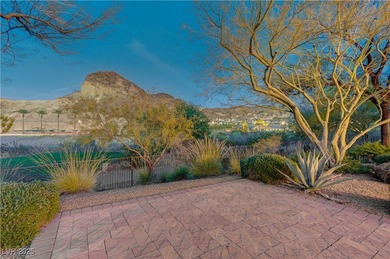 Sought after single-story home in Lake Las Vegas set on an on Falls Golf Course in Nevada - for sale on GolfHomes.com, golf home, golf lot