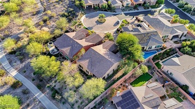 Sought after single-story home in Lake Las Vegas set on an on Falls Golf Course in Nevada - for sale on GolfHomes.com, golf home, golf lot