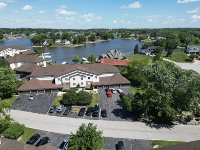 MOVE-IN-READY ~ FULLY FURNISHED and EQUIPPED (Just bring your on Lakes of the Four Seasons Country Club in Indiana - for sale on GolfHomes.com, golf home, golf lot