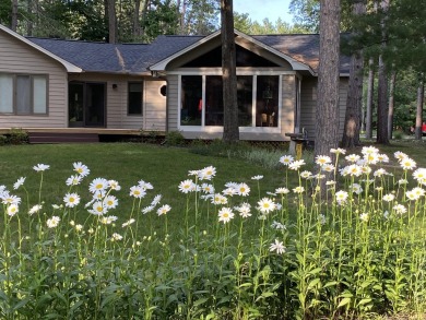 Welcome to Michaywe! This beautifully updated 3-bedroom, 2-bath on Michaywe Pines Course in Michigan - for sale on GolfHomes.com, golf home, golf lot