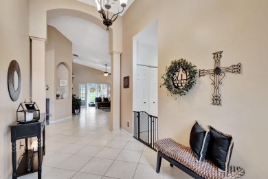 Exceptional home privately nestled within the gated community of on Atlantic National Golf and Country Club in Florida - for sale on GolfHomes.com, golf home, golf lot