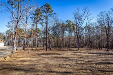 Discover your dream retreat on the picturesque shores of Greers on Thunderbird Country Club in Arkansas - for sale on GolfHomes.com, golf home, golf lot