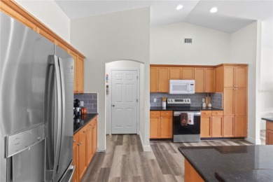 Short Sale. Welcome to this spacious 4-bedroom, 2-bath, 2-car on Bobcat Trail Golf Club in Florida - for sale on GolfHomes.com, golf home, golf lot