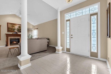 Step inside and feel the warmth of home. A grand foyer opens to on Renaissance Country Club in New Jersey - for sale on GolfHomes.com, golf home, golf lot