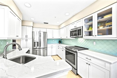 A SPECIAL UNIT WITH STUNNING LAKE VIEWS and NO FLOOD DAMAGE from on Bonita Bay West in Florida - for sale on GolfHomes.com, golf home, golf lot