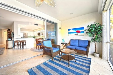 A SPECIAL UNIT WITH STUNNING LAKE VIEWS and NO FLOOD DAMAGE from on Bonita Bay West in Florida - for sale on GolfHomes.com, golf home, golf lot