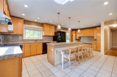 Welcome to this sprawling ranch that perfectly blends character on Community Golf Center  in Ohio - for sale on GolfHomes.com, golf home, golf lot