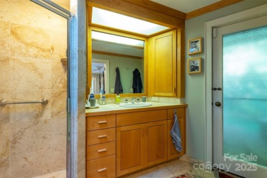 A rare opportunity awaits you in this secluded gem. You can live on Biltmore Forest Country Club in North Carolina - for sale on GolfHomes.com, golf home, golf lot