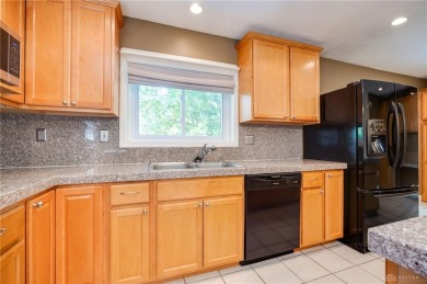 Welcome to this sprawling ranch that perfectly blends character on Community Golf Center  in Ohio - for sale on GolfHomes.com, golf home, golf lot