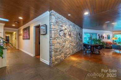 A rare opportunity awaits you in this secluded gem. You can live on Biltmore Forest Country Club in North Carolina - for sale on GolfHomes.com, golf home, golf lot