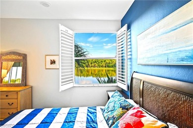 A SPECIAL UNIT WITH STUNNING LAKE VIEWS and NO FLOOD DAMAGE from on Bonita Bay West in Florida - for sale on GolfHomes.com, golf home, golf lot