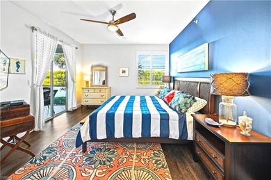 A SPECIAL UNIT WITH STUNNING LAKE VIEWS and NO FLOOD DAMAGE from on Bonita Bay West in Florida - for sale on GolfHomes.com, golf home, golf lot